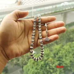 Masbaha.Tasbih. Metal plateado con incrustaciones de cristal azul. Rezo. Islam. ✈️ Envío internacional. Entrega estimada entre 15 y 30 días hábi en internet