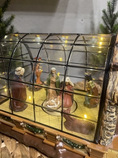Vila presepio com movimento/ luz e música 23x15x14xm na internet