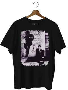 Remera Charly - Clics modernos (Nevada, Negra o Blanca) en internet