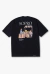 Camiseta preta oversized com estampa colorida na parte de trás mostrando uma feira livre com duas pessoas e frutas, texto "SOPRO DO BRASIL, COM ALMA".