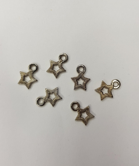 Dijes estrella chiquita x 10 unidades