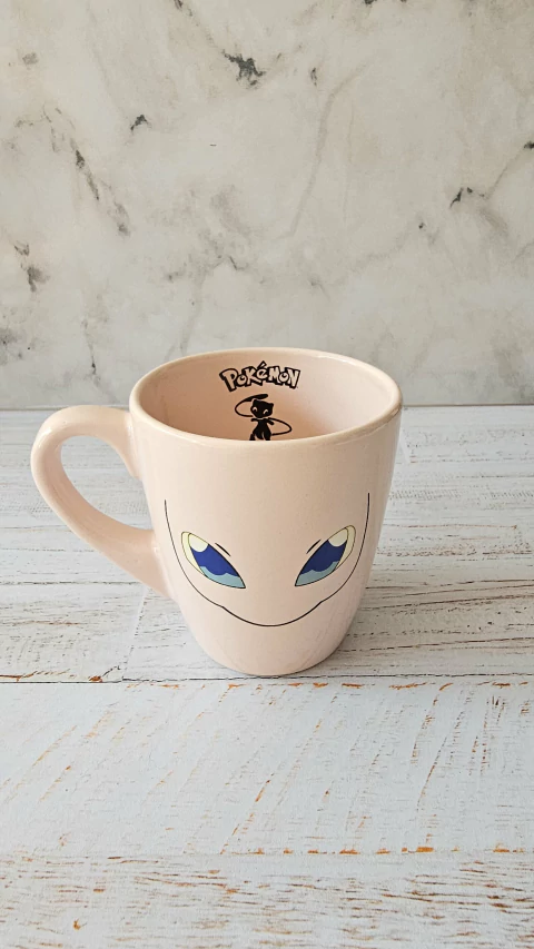 Taza Mew