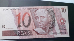 Cédula de 10 Reais de 2010 C 300 1ª Serie F 0001080109 C Chancelas de Guido Mantega e Henrique Meirelles Flor de Estampa - comprar online
