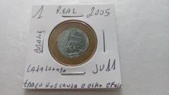 Moeda de 1 Real de 2005 Anel Aço Inox Banhado de Bronze e Núcleo Aço Inox Traço que Cruza o Olho da Efigie Catalogada JU 11 na internet