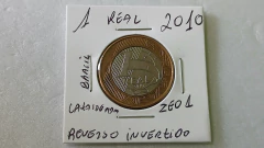 Moeda de 1 Real de 2010 Anel Aço Inox Banhado de Bronze e Núcleo de Aço Inox Reverso Invertido Catalogada ZE 01 - Mandrade Numismática