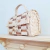 Bolsa infantil de palha natural na internet