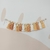 Varal Sensorial Tassel Amarelo Ocre - comprar online