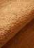 Almofada quadrada em tecido boucle na cor caramelo, com textura suave e aconchegante.