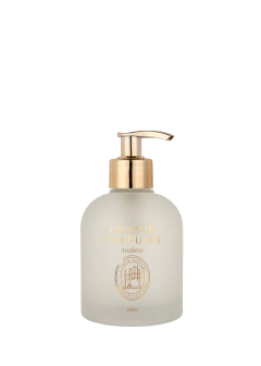 Frasco de sabonete líquido Magnólia Pacífica de 200ml com design elegante e pump dourado.