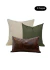 Kit de almofadas em offwhite, verde e marrom, composto por 3 peças, ideal para decoração de ambientes.