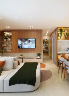 Manta em tricot tramado verde musgo sobre um sofá moderno em um ambiente de sala de estar decorado.