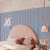 Ambiente decorado com o Painel Ripado Azul Autocolante Play 10x1 cm - Rolo com 2,5 metros | Coleção Meu Rodapé - RPDOL-12 - Ciça Braga
