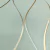 Detalhe do Papel de Parede Linhas Verde Chá Brilho Metálico Dourado Vinílico Lavável - Coleção Enchantment - 10 metros | 120103 - Ciça Braga