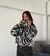 Buzo Teddy Zebra - comprar online