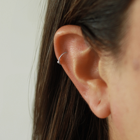 Piercing Aro Torcido Com Bolinha 9mm - comprar online