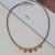 Choker couro trevos banhados a ouro - comprar online