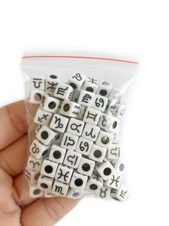 Dadinho branco com signos preto - 25 gramas