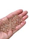 Conta 8mm transparente com glitter dourado - 25 gramas