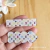 Placa Hair Clips LV branco colors