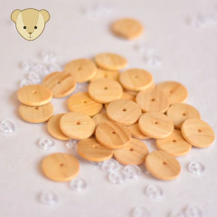 Botão com furo central para móbiles | 12 unidades