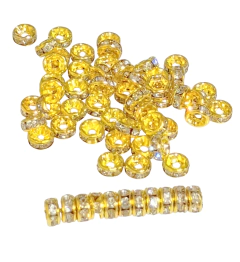 RUEDITA DE ALUMINIO DORADO CON STRASS 8 MM X 50 UNIDADES