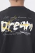 Remera con bolsillo dream