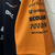 Camisa MC Laren 2025 Fórmula 1 - Masculina - Laranja e preta - loja online