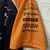 Imagem do Camisa MC Laren Norris 2025 Fórmula 1 - Masculina - Laranja e preta