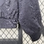 Imagem do Jaqueta Corta-Vento Manchester United 24/25 - Masculina Adidas - Azul com detalhes vermelhos e brancos