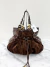 Bolsa Louis Vuitton Irene Suede Monograma - comprar online