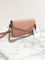 Bolsa Gucci GG Embossed Crossbody Light Pink na internet