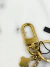 Chaveiro Louis Vuitton Capucine Initiales Bag Charm - loja online