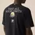 CAMISETA FILA COMFORT GRAPHIC SPORT CLUB - PRETO - loja online