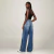 CROPPED TOMMY JEANS BUCKLE PLEAT na internet