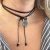 Choker Forever com cordão de seda preto encerado com pingente em formato de coração no banho de ródio branco gravado com a mensagem "Forever In My Heart".