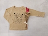 REMERA MONSTRUITO BEIGE