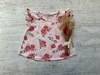 MUSCULOSA CORTA MANGA VOLADO FLOREADA ROSA