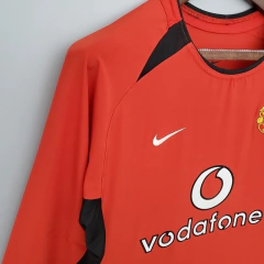 CAMISA RETRÔ DO MANCHESTER UNITED - MANGA LONGA - HOME 02/04