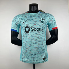 CAMISA DO BARCELONA VERSÃO JOGADOR - THIRD 23/24