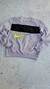 Buzo Windbreaker Nike Big Swoosh de los años 90 en color lila con detalles en negro y amarillo, destacando el logo de Nike.