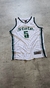 Musculosa de baloncesto Nike del equipo Michigan State Spartans de los años 90, con el número 5 y el texto "State" en verde sobre fondo blanco.