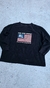 Buzo negro de Ralph Lauren con el logo de Polo Jeans Company y la bandera en el diseño.