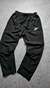 Pantalón Rompevientos Nike