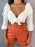 Short couro eco - caramelo