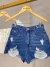 Short jeans cós alto destroyed - lavagem escura na internet