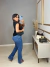 Calça jeans com a barra aberta lateral - escura on internet