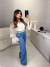 Calça jeans wide leg - lavagem média na internet