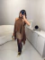 Blusa bata gola alta com ponta em babados - marrom