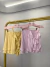 Conjunto de saia e blusa com babados e amarração frontal - amarelo - Amor de Peça - Looks Femininos Estilosos, Loja de Roupa Feminina Online