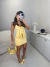Conjunto de saia e blusa com babados e amarração frontal - amarelo - loja online
